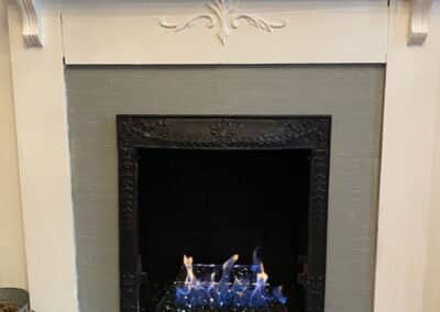 black gas fireplace with glass front