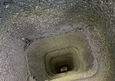 chimney liner coated with creosote