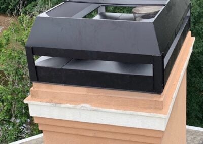 rain pan and shroud on stucco chimney