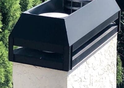 rain pan and shroud on stucco chimney