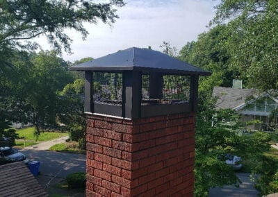 brick chimney with new chimney cap