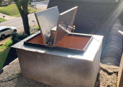 chimney damper on stone chimney