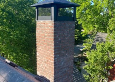 Deteriorated Chimney Rebuild from Roomline with cap