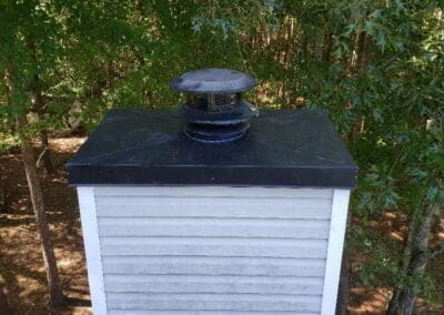 modern chimney with new rain pan