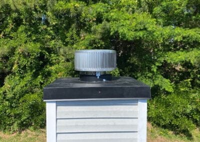 modern chimney with new rain pan