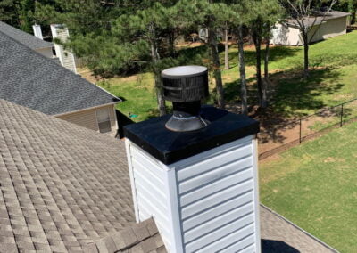 modern chimney with new rain pan