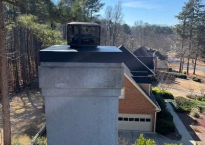 stucco chimney with new rain pan
